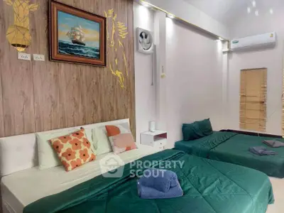 Spacious bedroom with modern decor and air conditioning