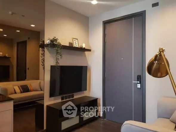 Modern living room with sleek TV setup and stylish decor