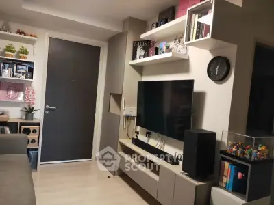 Modern living room with sleek TV setup and stylish shelving