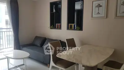 Modern living room with elegant dining area and stylish decor