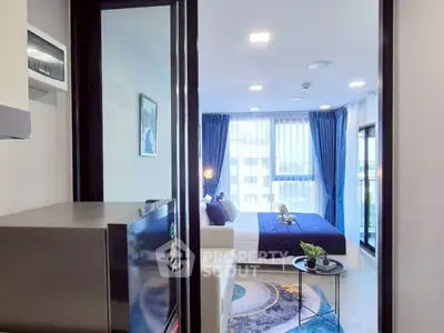 Modern bedroom with large windows and stylish decor in a high-rise apartment.