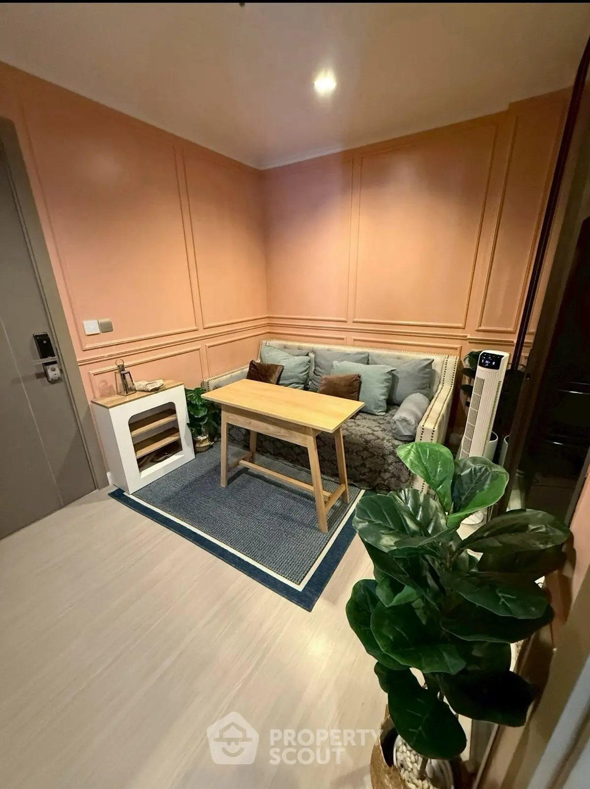 Cozy living room with stylish decor and comfortable seating area.