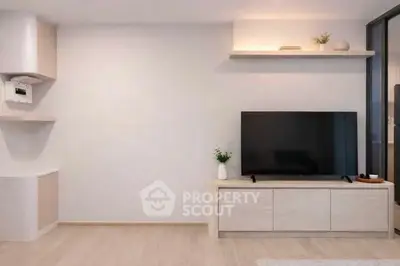 Modern living room with sleek TV setup and minimalist decor