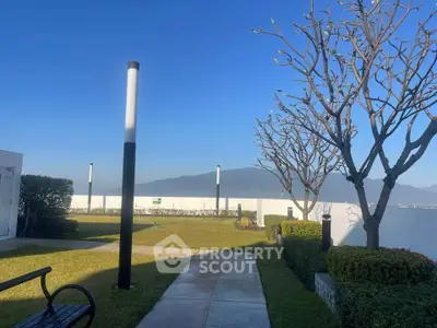 Stunning garden with mountain view and modern lighting in a serene setting.