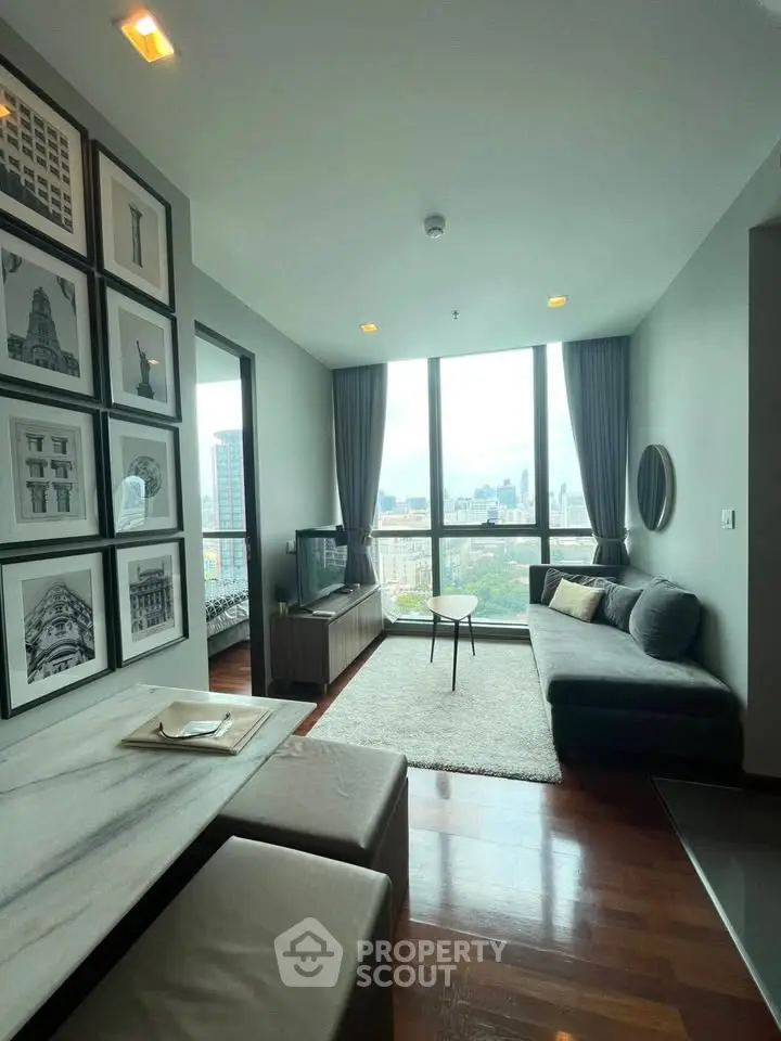 Modern living room with panoramic city view and stylish decor