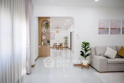 Spacious modern living room with elegant decor and natural light