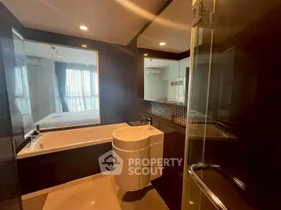 Modern bathroom with sleek design and bathtub in luxury apartment