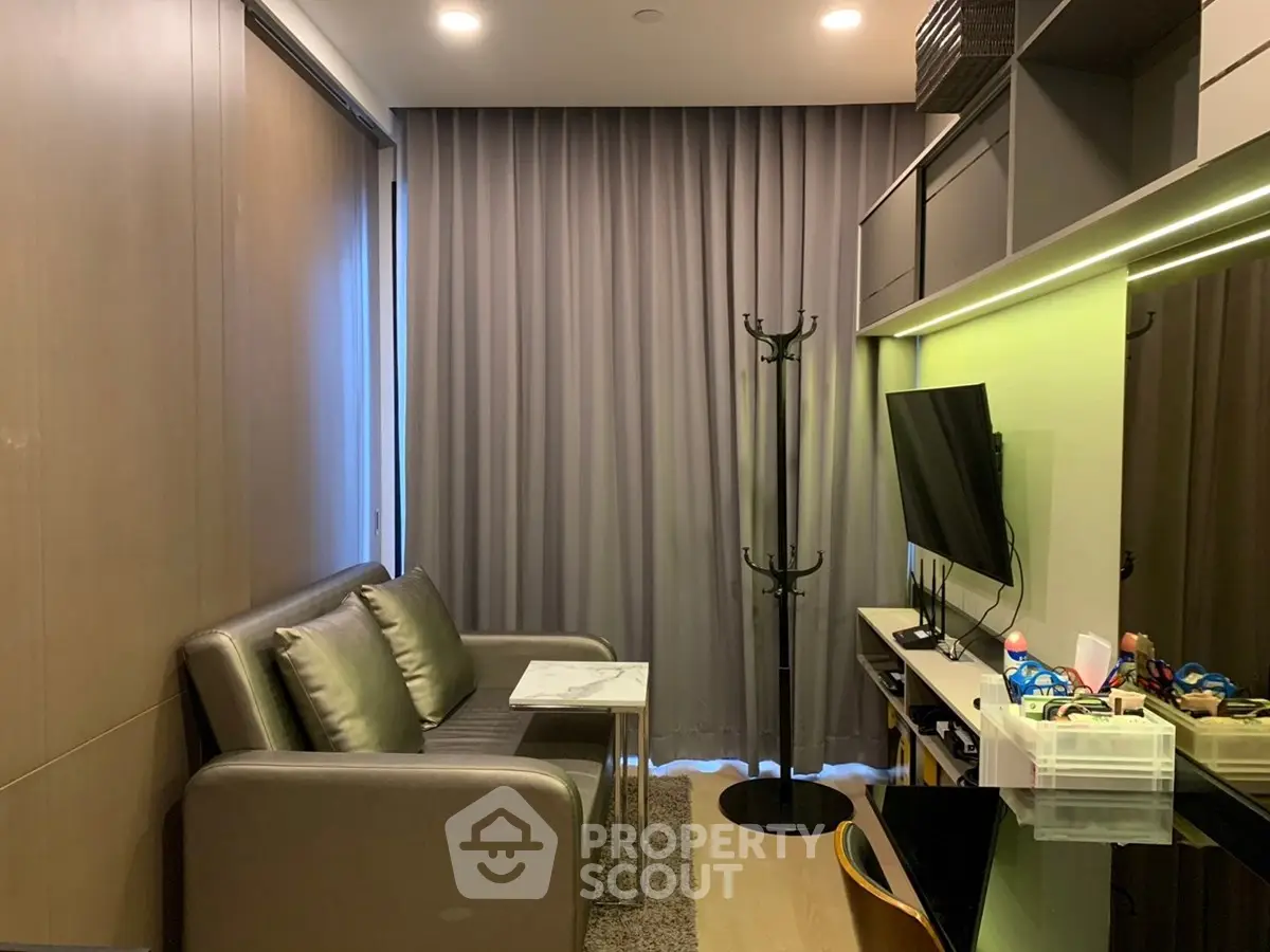 Modern living room with sleek furniture and ambient lighting