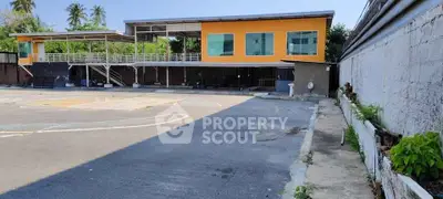 Spacious commercial property with ample parking and modern design, ideal for business expansion.