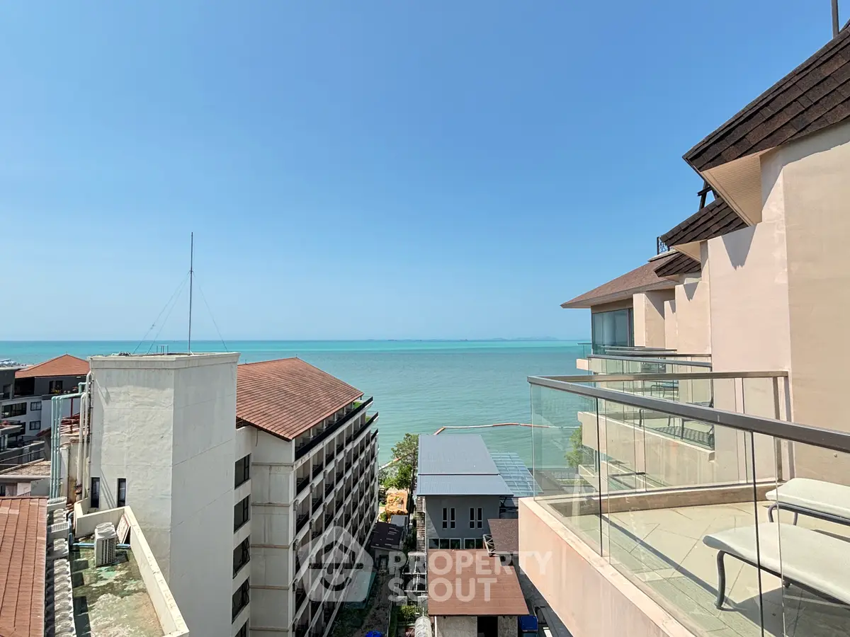 Stunning ocean view from a modern balcony in a coastal property, perfect for relaxation and enjoying the sea breeze.