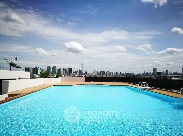 Stunning rooftop pool with panoramic city skyline views