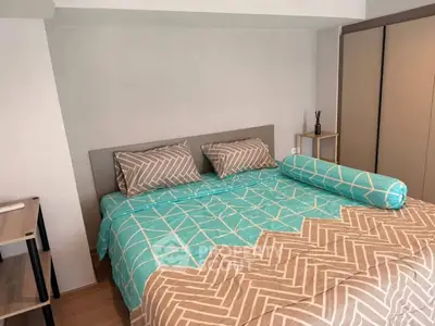 Cozy bedroom with modern decor and stylish bedding