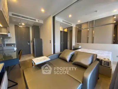 Modern studio apartment with sleek design and comfortable furnishings