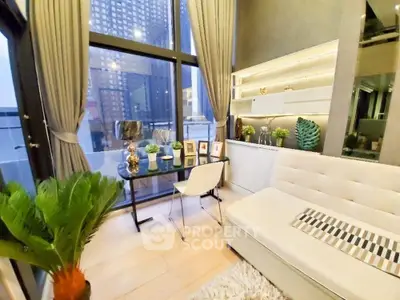 Modern living room with floor-to-ceiling windows and stylish decor