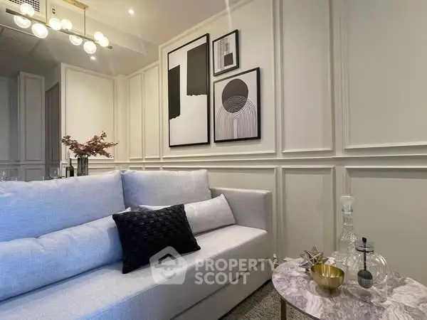 Elegant living room with modern decor and stylish wall art