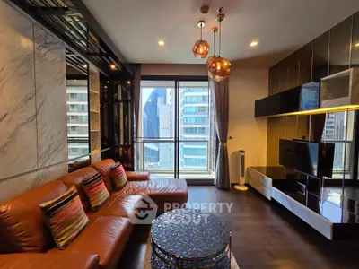 Luxurious modern living room with leather sofa and city view, featuring elegant lighting and stylish decor.