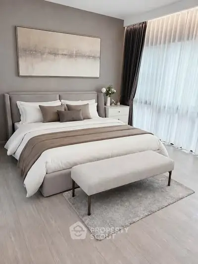 Luxurious modern bedroom with elegant decor and natural light