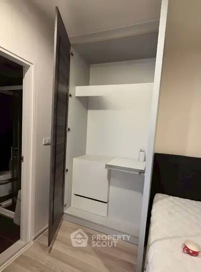 Modern bedroom with built-in storage and sleek design