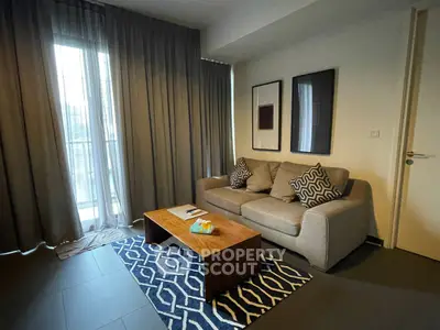 Modern living room with stylish decor and natural light