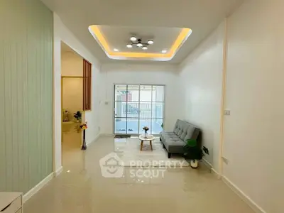 Modern living room with sleek design and cozy seating area