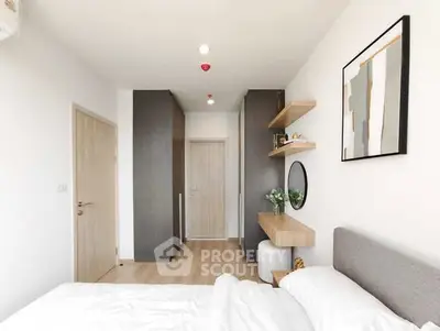 Modern bedroom with minimalist decor and stylish shelving