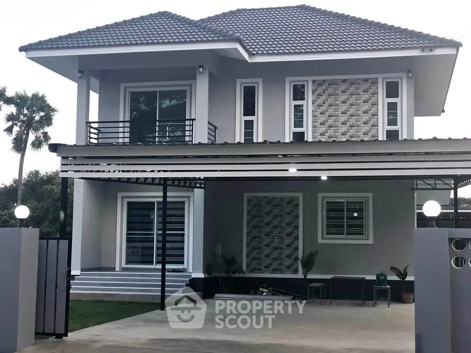 Modern two-story house with stylish facade and spacious driveway