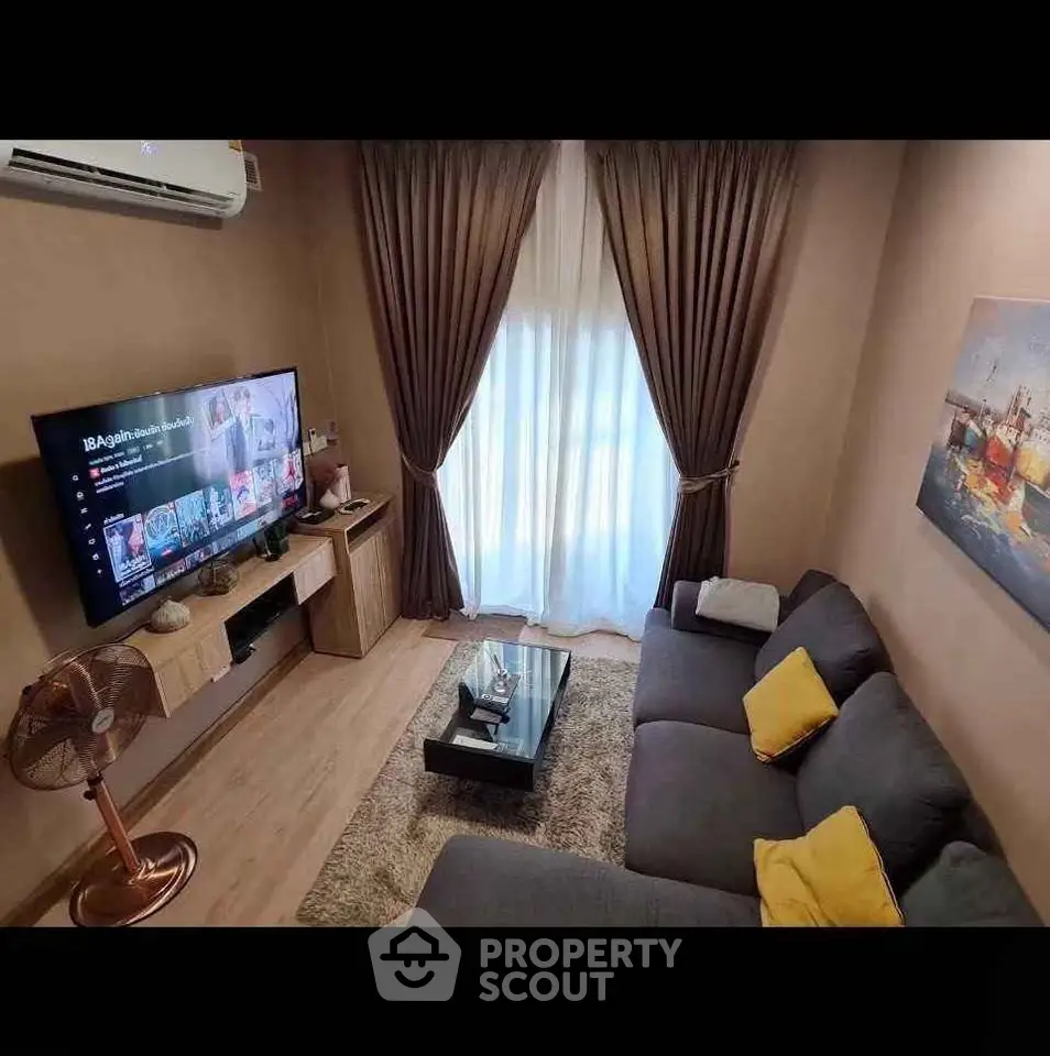 Cozy living room with modern decor and entertainment setup