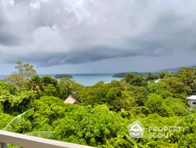 Stunning ocean view from lush green balcony in tropical paradise