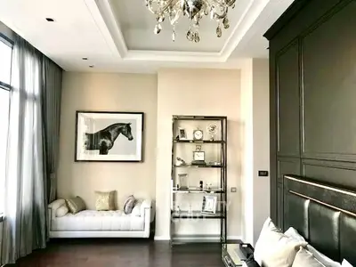 Luxurious living room with elegant decor and chandelier lighting