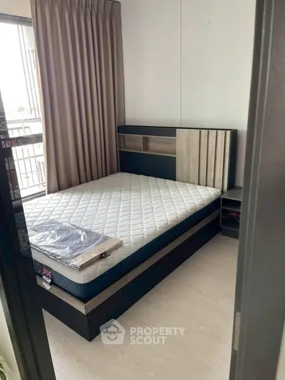 Modern bedroom with stylish bed and natural light from window