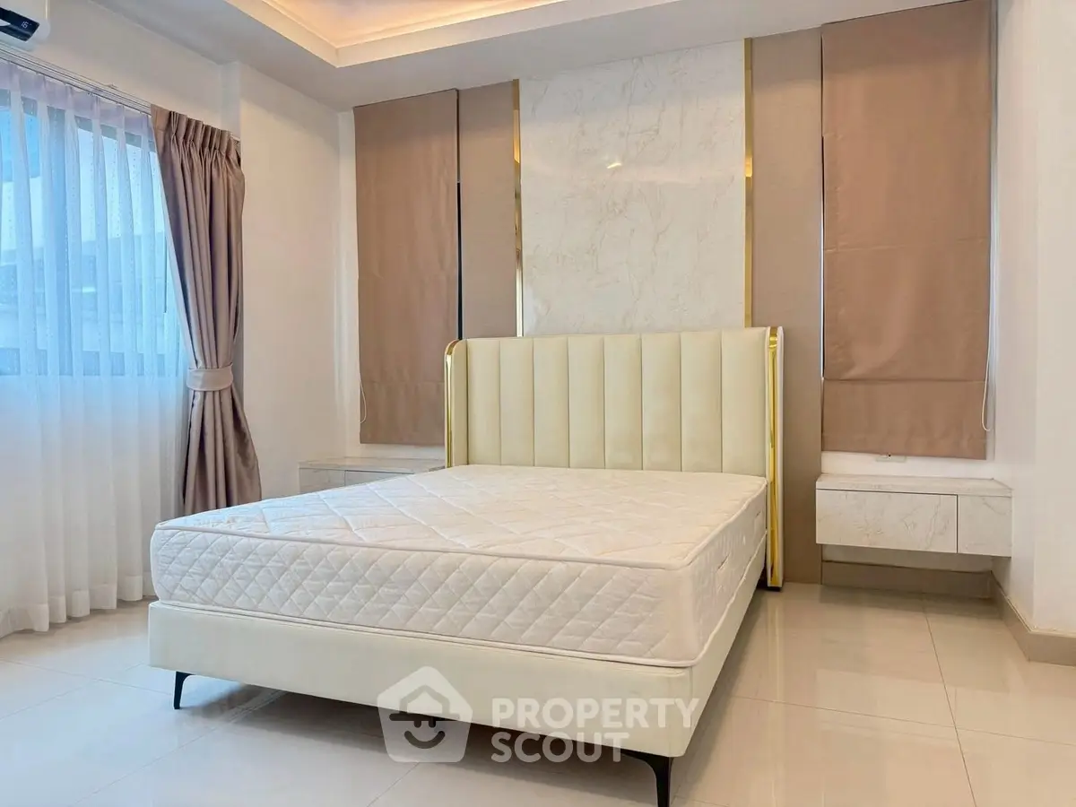 Luxurious bedroom with elegant design and natural light