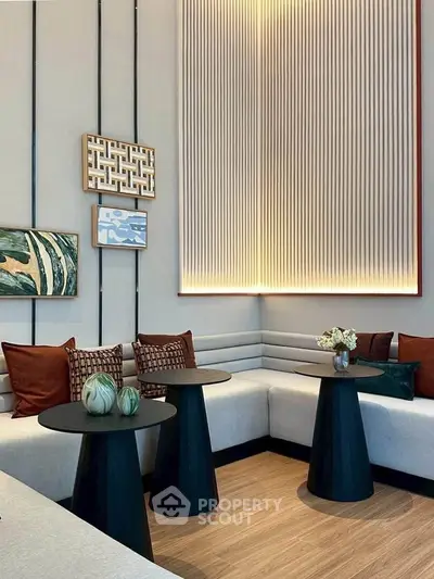 Stylish modern living room with elegant decor and cozy seating area.