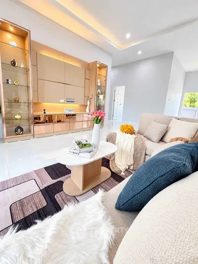 Luxurious modern living room with elegant decor and cozy seating area, perfect for relaxation and entertainment.