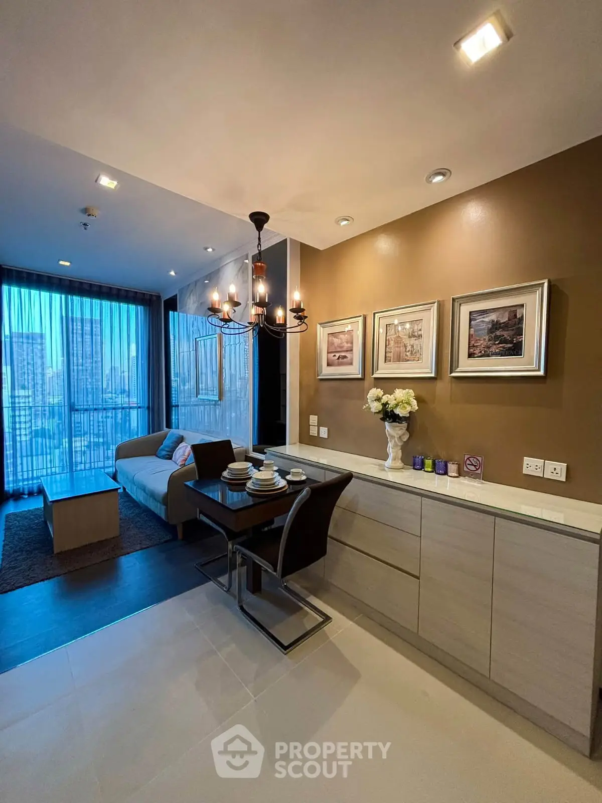 Modern living room with elegant dining area and city view