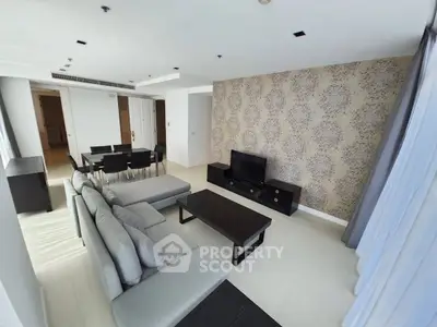 Spacious modern living room with elegant decor and ample natural light