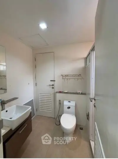 Modern bathroom with sleek fixtures and neutral tones