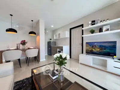 Modern living room with stylish decor, open layout, and dining area, perfect for contemporary living.