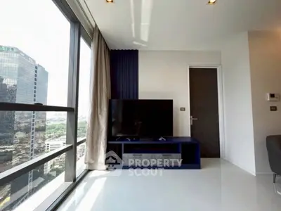 Modern living room with large windows and city view