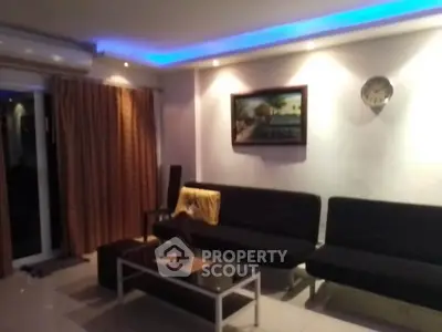 Modern living room with ambient lighting and stylish decor