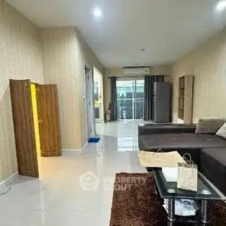 Spacious living room with modern furniture and open layout