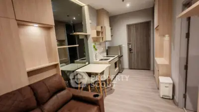 Modern apartment interior with cozy living area and compact kitchen design