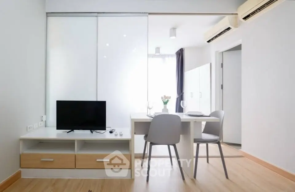 Modern minimalist living room with sleek furniture and natural light