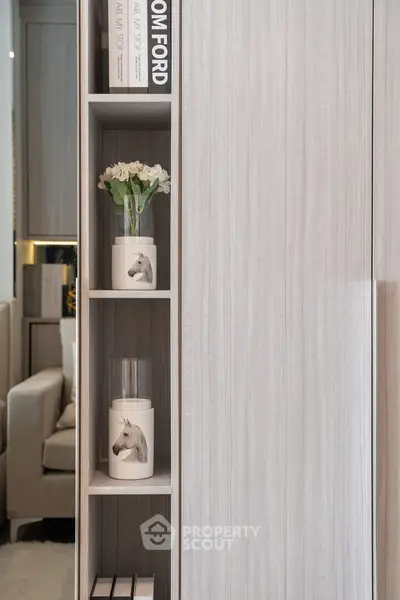 Modern interior with stylish shelving and decorative accents in a cozy living space.