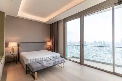 Luxurious bedroom with panoramic city view and modern decor