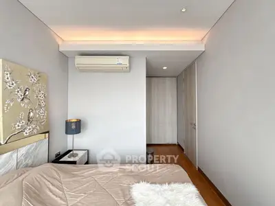 Modern bedroom with elegant decor and cozy ambiance