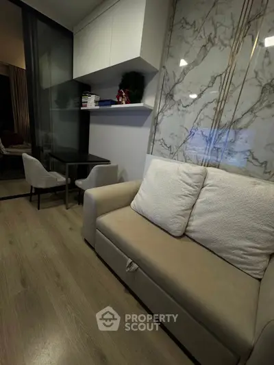 Modern living room with stylish decor and cozy seating area