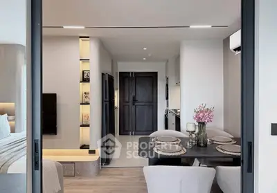 Modern open-plan living and dining area with sleek design and elegant decor