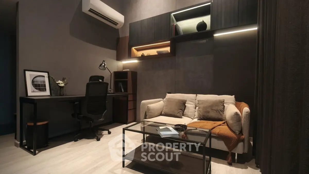 Modern study room with stylish decor and cozy seating area, perfect for productivity and relaxation.