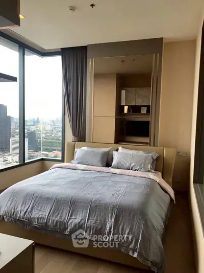Luxurious bedroom with stunning city view and modern decor