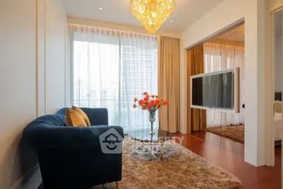 Luxurious living room with elegant chandelier and modern decor